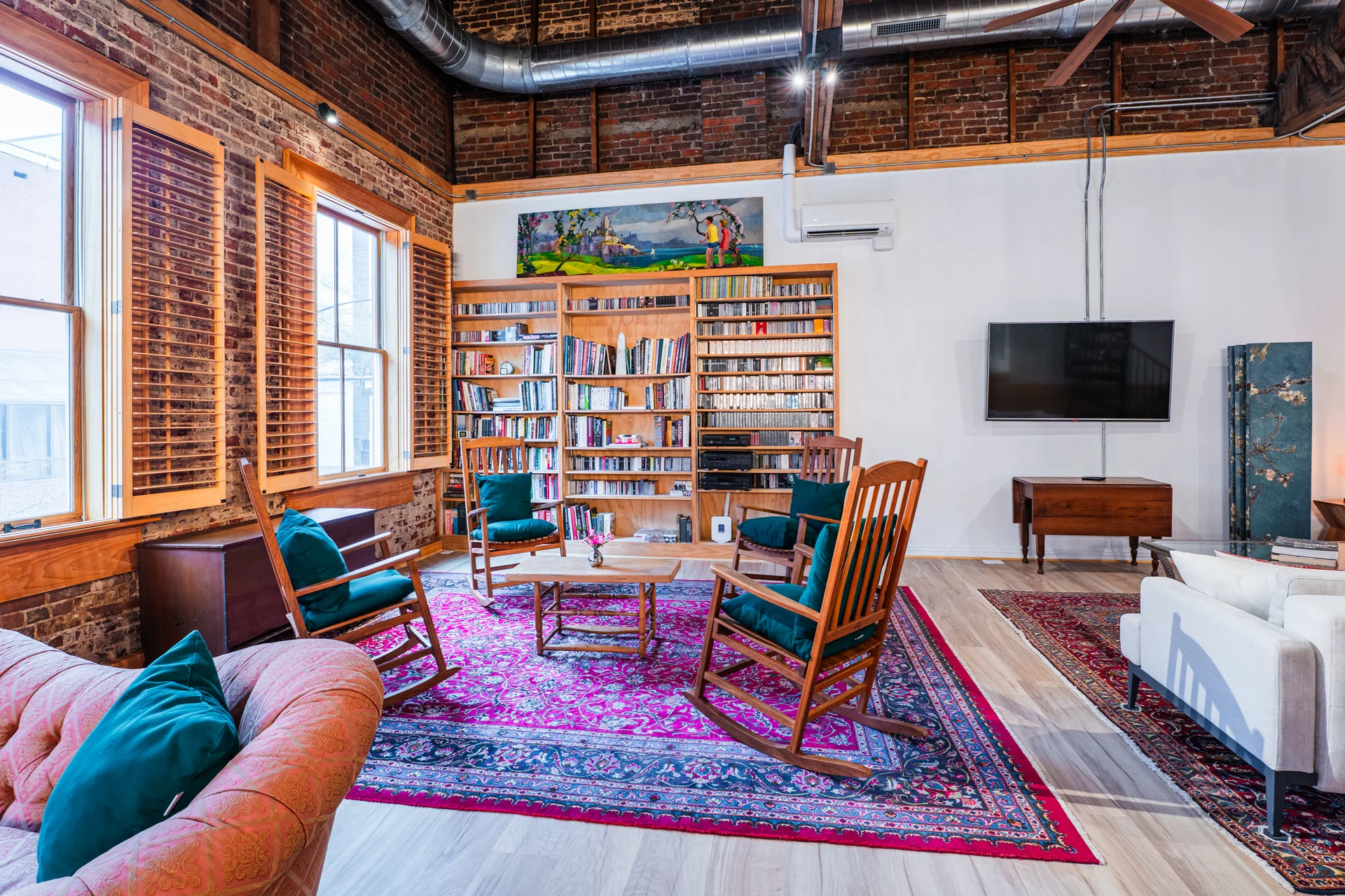 Sitting area with curated bookshelf