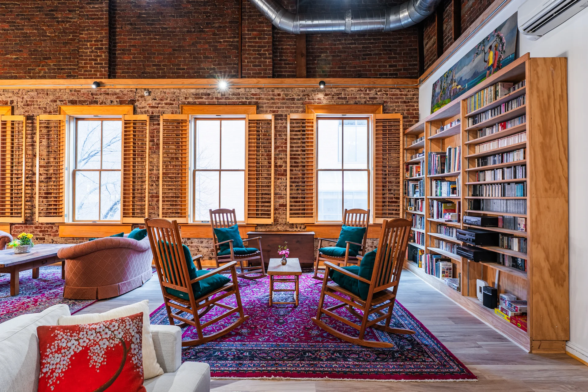 Library nook with books and Bluetooth speaker